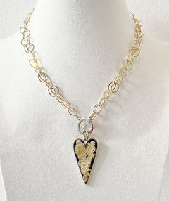 Gold heart charm necklace