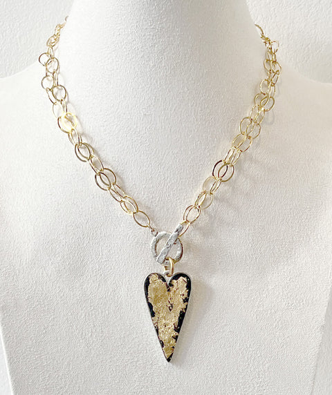 Gold heart charm necklace