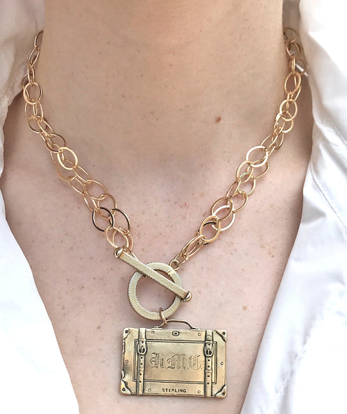 Suitcase necklace gold - Premium necklaces from Apunto - Just $250! Shop now at Mary Walter