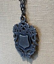 Gunmetal Crest Necklace