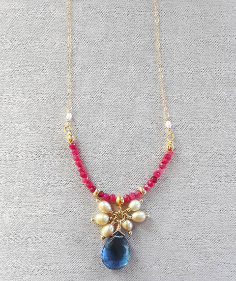 Blue topaz and ruby necklace